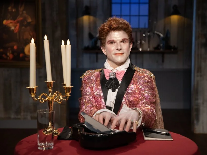 Zac in costume at judges table, as seen on Halloween Baking Championship, Season 6.