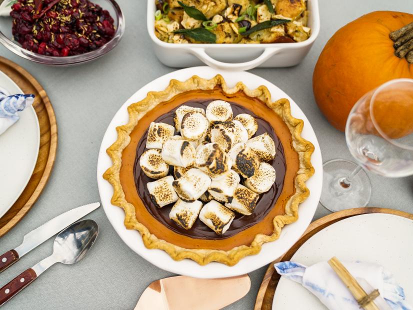Outdoor table setting; overhead of Nunya Business S'more Pumpkin Pie dish, as seen on Sunny Anderson Thanksgiving.