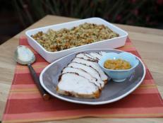 Get a complete turkey dinner on the table without all the fuss of cooking a whole bird. Tender, boneless breast cooks quickly and feeds a smaller crowd. A quick cider brine and sweet peach glaze keep it moist and flavorful. Put the stuffing in the oven when you lower the temperature for the turkey&mdash;then everything will be ready at once.