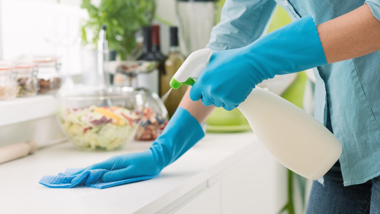 https://food.fnr.sndimg.com/content/dam/images/food/fullset/2020/11/18/fn_woman-cleaning-counter-getty_s4x3.jpg.rend.hgtvcom.1280.720.suffix/1605721482346.jpeg