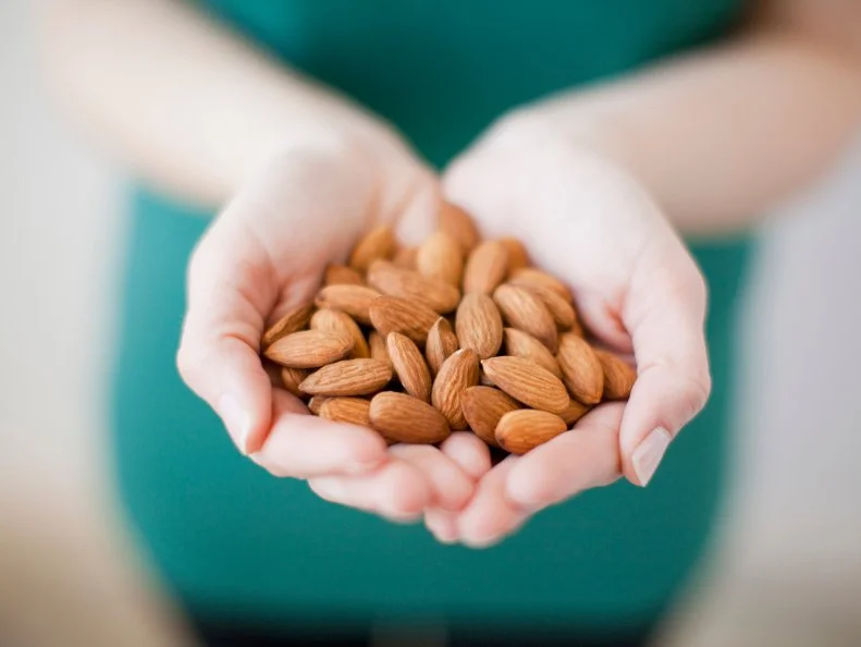 <a target="_blank" href="https://pubmed.ncbi.nlm.nih.gov/27807041/">Research shows</a> that almonds can lower blood pressure when added to a calorie-restricted diet. A 2016 study published in the Journal of Nutrition had participants eat 15-percent of their daily calories from almonds or a low-calorie diet without nuts. Those in the almond group had lower blood pressure compared to those who at a low-calorie diet without nuts. Researchers explained that the results could be due to the heart healthy monounsaturated fats found in almonds.