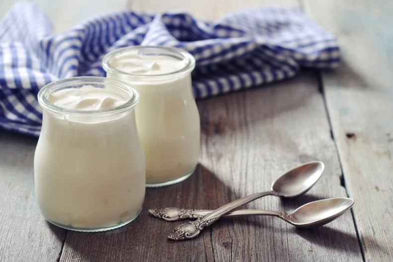 <a target="_blank" href="https://www.ncbi.nlm.nih.gov/pmc/articles/PMC5105034/">A 2016 review study</a> published in Advanced Nutrition concluded that total dairy food consumption is linked with a lower risk of high blood pressure. Low and nonfat dairy are recommended for less saturated fat, which is also part of the DASH (Dietary Approaches to Stop Hypertension) Diet and the 2015-2020 dietary guidelines for Americans. Because Greek yogurt in particular is strained, it is about 40% lower in sodium. However, all nonfat and low fat dairy in a balanced diet can help lower blood pressure. 