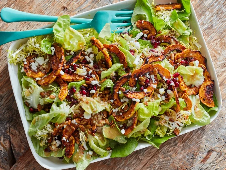 Food Network Kitchen's Maple-Roasted Delicata Squash with Spiced Pepitas.