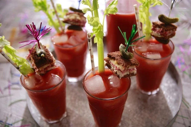 Beauty shot of Molly Yeh's Caraway Bloody Marys with Mini Reubens, as seen on Girl Meets Farm, season 7.