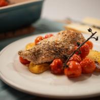 Katie Lee Biegel makes Roasted Chicken and Cherry Tomatoes and Polenta, as seen on The Kitchen, season 27.