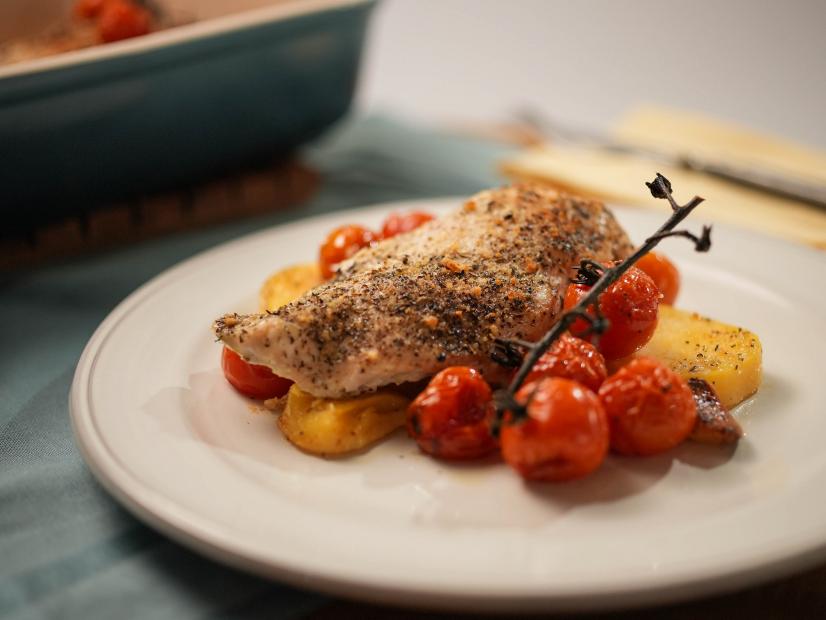 Katie Lee Biegel makes Roasted Chicken and Cherry Tomatoes and Polenta, as seen on The Kitchen, season 27.