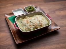 I am a HUGE fan of the Mexican kitchen! This recipe is tasty, delicious and packed with flavor. The ingredients are readily available at most stores, and although the recipe has several steps it is very &ldquo;doable&rdquo; even for beginner cooks. These chicken enchiladas can also be done with pork or just veggies and ALWAYS provides LOTS of deliciousness!!!
