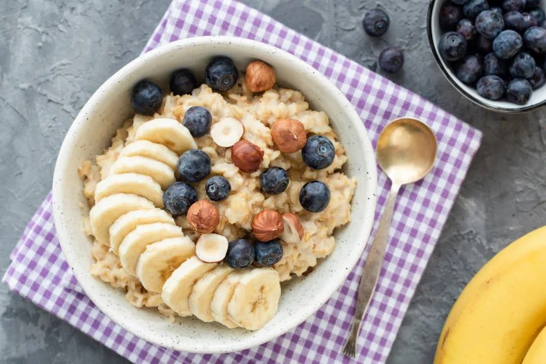 Oatmeal is a comfort food to many and contains oats, which signals the brain to make more serotonin. Although all carbs signal the brain to produce this feel-good chemical, whole grain oats take longer to digest, which means a steady supply of serotonin for a longer period of time. 