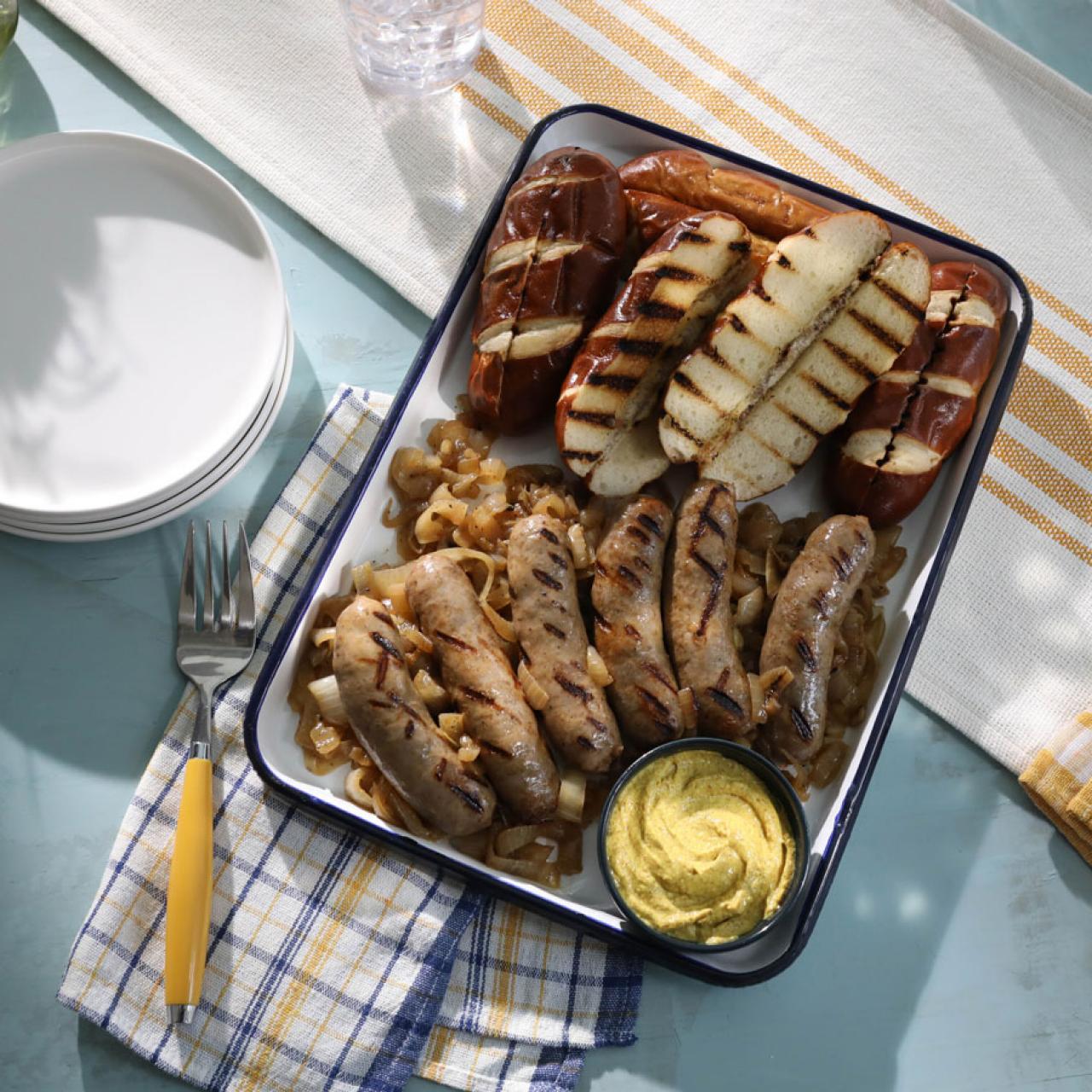 https://food.fnr.sndimg.com/content/dam/images/food/fullset/2021/01/25/QK407_Grilled-Bratwurst-with-Caramelized-Onions_s4x3.jpg.rend.hgtvcom.1280.1280.suffix/1611594820821.jpeg