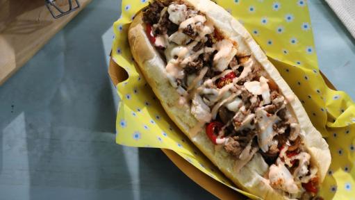 https://food.fnr.sndimg.com/content/dam/images/food/fullset/2021/01/25/QK407_Surf-and-Turf-Philly-Cheesesteak_s4x3.jpg.rend.hgtvcom.511.288.suffix/1611594821071.jpeg