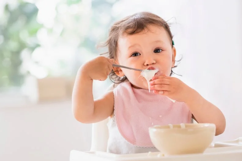 Potentially allergenic foods, especially peanut foods and eggs, should be introduced to babies alongside other complementary foods at about 6 months of age once a couple of other foods have been successfully introduced. According to Coleman Collins: “Research shows that early introduction of allergens can reduce the risk of food allergies in all babies, which is why this advice was included in the latest Dietary Guidelines for Americans, but especially those who may have higher risk (such as those with severe eczema or existing allergies). Parents can discuss when to introduce allergens to their baby based on their specific risk, but in most cases it’s not necessary to see a doctor first.”  