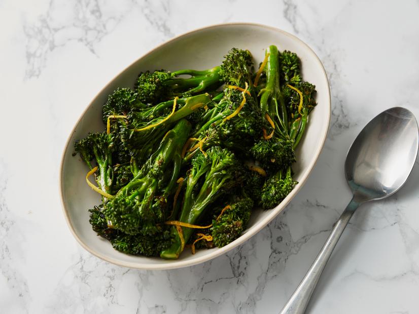 Close-up of Lemon Garlic Broccolini and a spoon