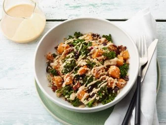 Food Network Kitchen’s Quinoa Power Bowls with Butternut Squash and Tahini Sauce, as seen on Food Network.