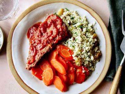 Harrisa Pork with Glazed Carrots and  Couscous