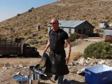 Chef Robert Irvine cooking for paranormal investigators at the Cerro Gordo Mines, as seen on Dinner: Impossible Season 9.