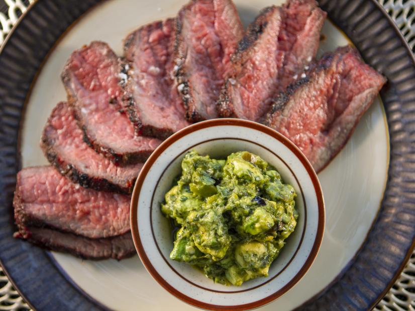 Crista Luedtkeís New Mexico Chili Rubbed Tri-Tip with Charred Onion and Avocado Salsa, as seen on Guyís Ranch Kitchen Season 4.