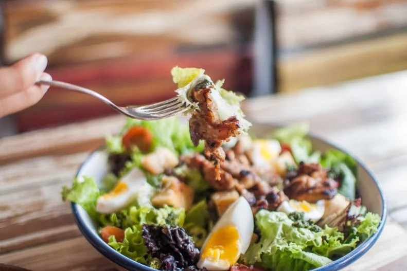 Lisa Andrews, MEd, RD, LD Owner, <a target="_blank" href="https://soundbitesnutrition.com/">Sound Bites Nutrition</a> suggests making your goal to include some form of protein with all meals such as eggs, Greek yogurt, lean meat, fish, beans, or nuts. Andrews explains that “protein foods provide better satiety (feeling of fullness) between meals than carbohydrates.” In addition, they “use more calories to metabolize and digest than carbs or fat.” Most of Andrew’s clients want to lose weight or improve their energy, and they find adding protein at every meal a simple goal to meet. 