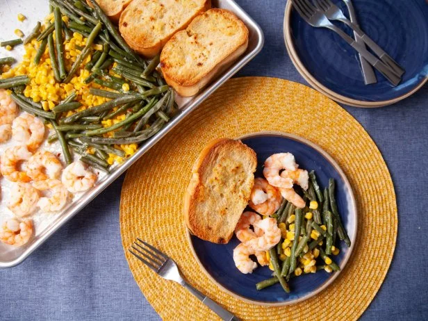 Here we combine three things everyone appreciates: the flavors of shrimp scampi, garlicky seasoning on tender Birds Eye® Steamfresh® vegetables and the ease of a sheet pan dinner. We made this even more weeknight friendly by replacing the typical white wine that goes in traditional scampi sauce with a last-minute squeeze of lemon.