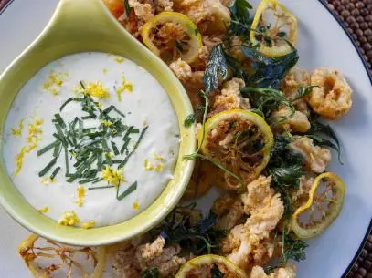 Marc Murphy’s Fried Calamari with Fried Lemons, Parsley and Lemon Aioli, as seen on Guy’s Ranch Kitchen Season 4.