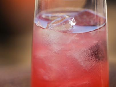 Eric Greenspan's Tom Collins with Black Pepper and Cherries, as seen on Guy's Ranch Kitchen Season 4.