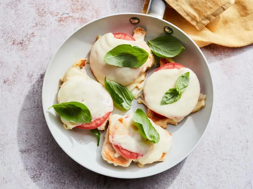 Description: Food Network Kitchen's Caprese Chicken Breasts Pan-Fried from Frozen. Keywords: Chicken Breasts, Black Pepper, Salt, Beefsteak Tomato, Mozzarella, Basil