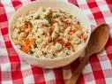 Description: Food Network Kitchen's Creamy Ranch Pasta Salad. Keywords: Fusilli Pasta, Carrot, Mayonnaise, Sour Cream, Chives, Celery, Lemon, Worcestershire Sauce, Onion Powder, Garlic, Parmesan