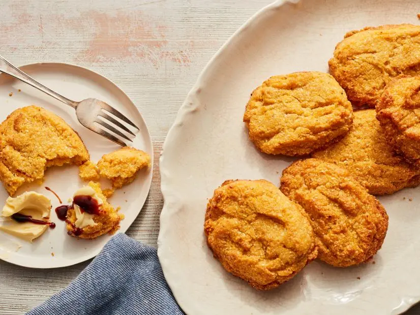 Description: Food Network Kitchen's Easy Cornpone. Keywords: Cornmeal, Canola Oil, Salt, Butter, Molasses, Honey