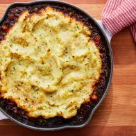 Description: Food Network Kitchen's Vegan Shepherd’s Pie. Keywords: Creamer Potatoes, Garlic, Chives, Cremini Mushrooms, Tomato Paste, Rosemary, Peas, Carrots