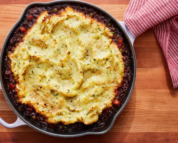 Description: Food Network Kitchen's Vegan Shepherd’s Pie. Keywords: Creamer Potatoes, Garlic, Chives, Cremini Mushrooms, Tomato Paste, Rosemary, Peas, Carrots
