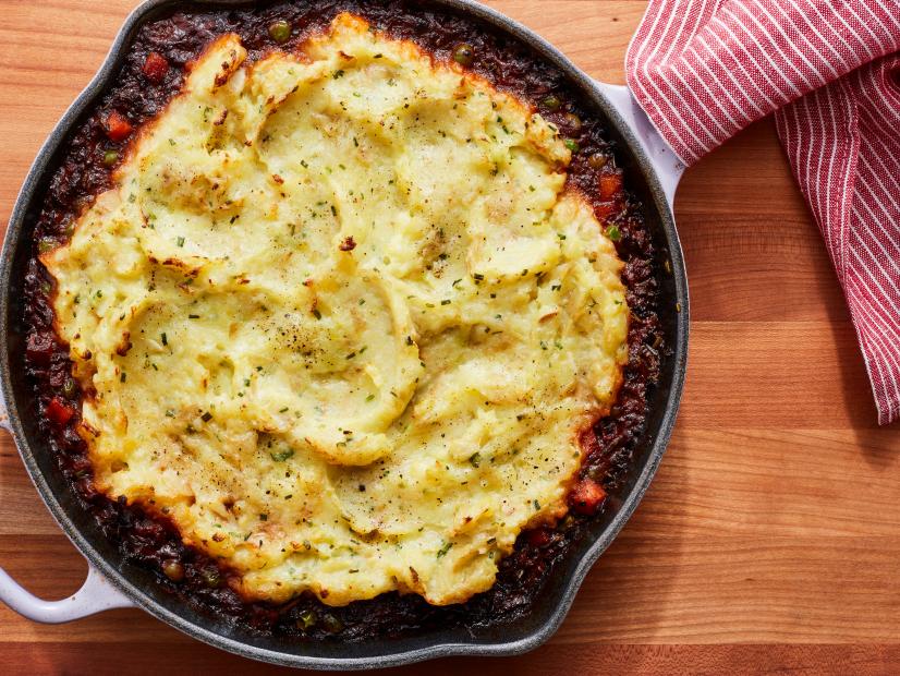 Description: Food Network Kitchen's Vegan Shepherd’s Pie. Keywords: Creamer Potatoes, Garlic, Chives, Cremini Mushrooms, Tomato Paste, Rosemary, Peas, Carrots
