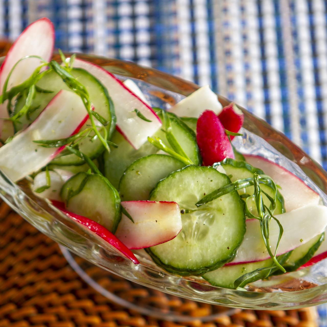 https://food.fnr.sndimg.com/content/dam/images/food/fullset/2021/03/21/0/YK414_Radish-and-Cucumber-Salad_s4x3.jpg.rend.hgtvcom.1280.1280.suffix/1616362819487.jpeg