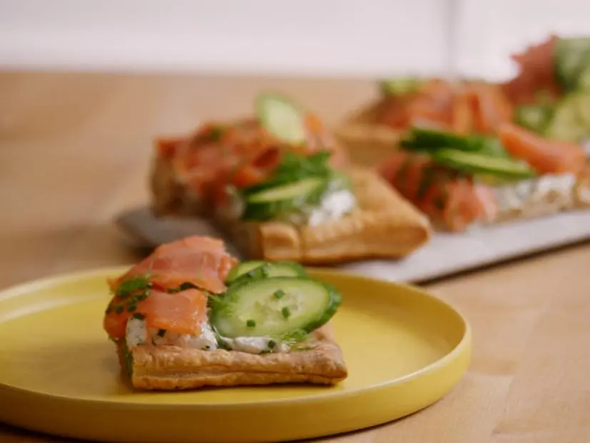Toasts with spread on plates on yellow and white plates as seen on Un-Choppable, Season 1.