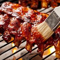 Rack of baby back ribs on the grill.  Please see my portfolio for other food related images.