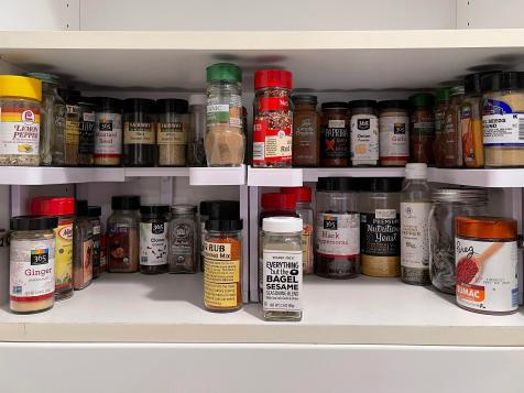 https://food.fnr.sndimg.com/content/dam/images/food/fullset/2021/04/05/spice-cabinet-organized-with-spicy-cainet-organizer.jpg.rend.hgtvcom.476.357.suffix/1617644792904.jpeg