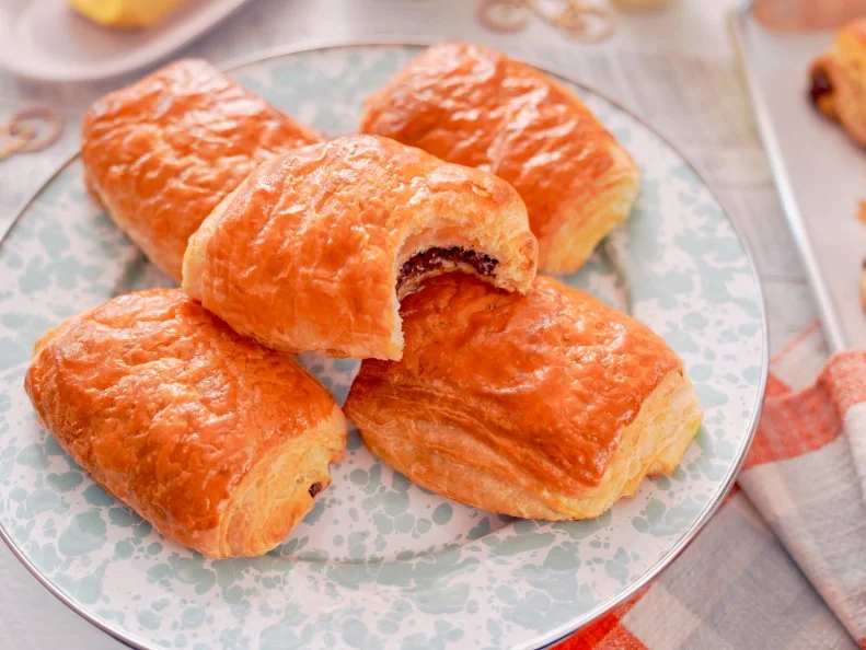 Beauty shot of Molly Yeh's Chocolate Croissants, as seen on Girl Meets Farm, Season 8.