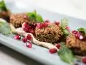 Geoffrey Zakarian makes Pistachio Falafel with  a Cardamom-Yogurt Sauce, as seen on The Kitchen, season 28.