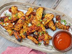 Food Network Kitchen's Grilled Barbecued Corn Ribs.