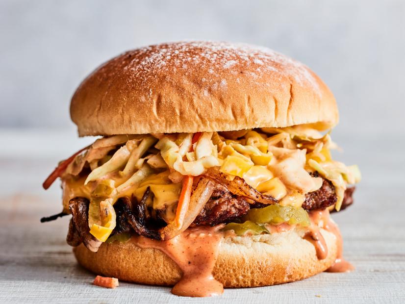 Description: Food Network Kitchen's Oklahoma Onion Burgers With Creamy BBQ Coleslaw.
