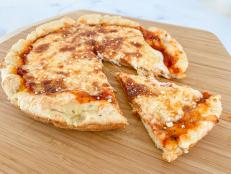 This recipe is sponsored by Target. I am certifiably pizza-obsessed. Several years ago, I went to a pizza school called Verace Pizza Napoletana, whose mission is to &ldquo;defend the honor of Neapolitan pizza.&rdquo; To me, there is no pizza better than a Neapolitan pizza margherita. A thin, bubbly crust made of double-zero flour, simple tomato sauce, fresh mozzarella, a drizzle of extra-virgin olive oil, and fresh basil, cooked in 90 seconds in a 900 degrees F (480 degrees C) wood-burning pizza oven. My mouth is watering just thinking about it. Let&rsquo;s be honest, though, it&rsquo;s not realistic to make that kind of pizza at home very often, if at all. If you find yourself with a hankering for pizza, and you want to whip up a homemade version without waiting for dough to rise, this is the recipe for you. Homemade pizza dough with just two ingredients&mdash;Greek yogurt and self-rising flour&mdash;and no wait time for it to rise. It&rsquo;s food science at its best!