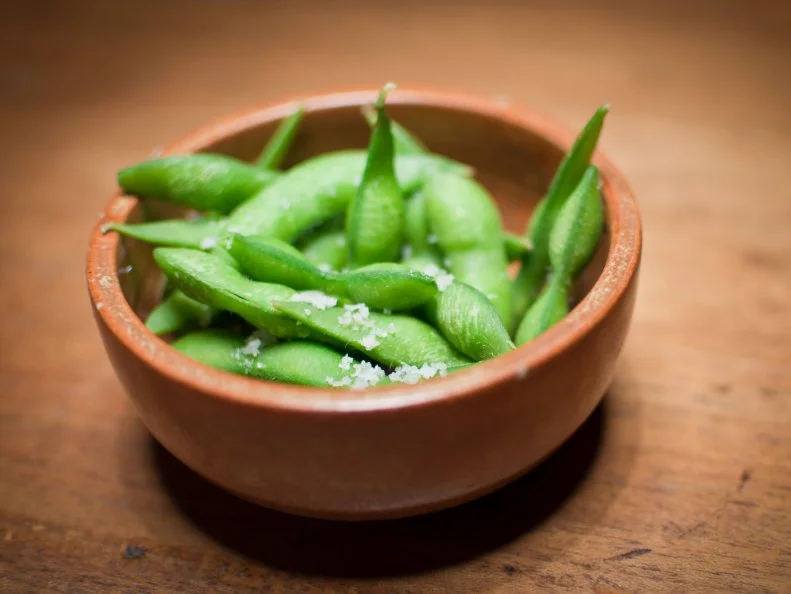 Edamame bean with salt in bowl.
