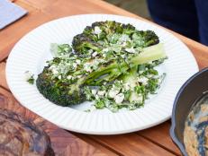 This recipe is sponsored by Walmart. This recipe is a great way to bring a meaty texture to your summer table without the meat. It can be served as part of a steakhouse dinner on the grill or even in place of meat for a meatless Monday. The recipe also works wonderfully with cauliflower, cabbage or any other hearty vegetable. Choose bigger, sturdier heads of broccoli. This is the type of recipe where carefully selecting your produce matters!