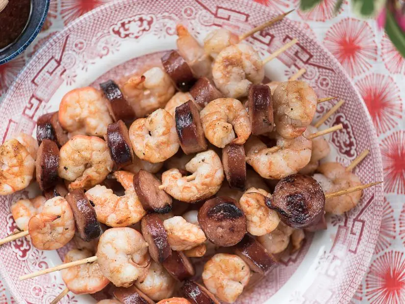 Overhead skewers on a plate, as seen on The Juneteenth Menu