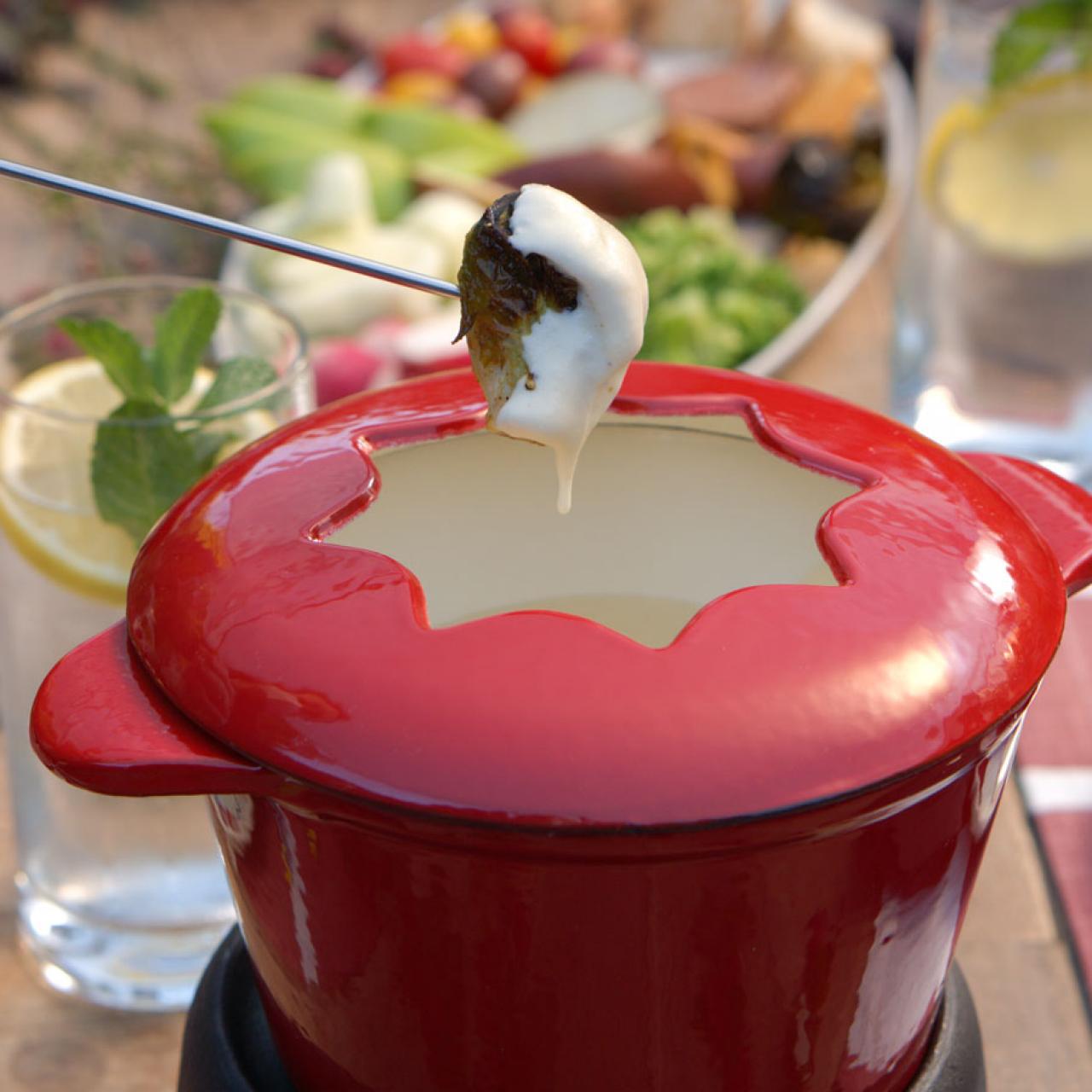 https://food.fnr.sndimg.com/content/dam/images/food/fullset/2021/05/28/VB1205_Four-Cheese-Fondue-with-Assorted-Dippers_s4x3.jpg.rend.hgtvcom.1280.1280.suffix/1622209138559.jpeg
