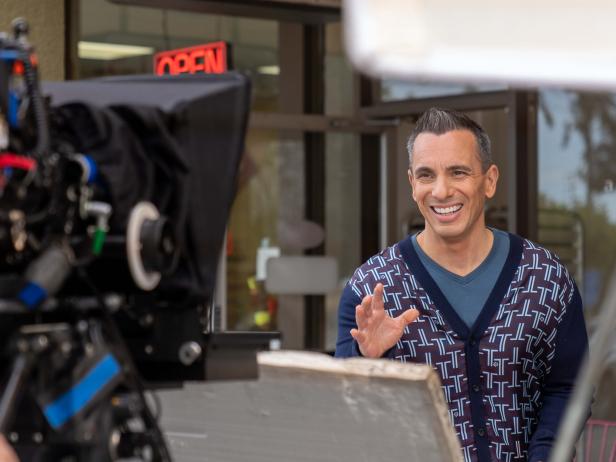Behind the scenes with host Sebastian Maniscalco outside of Twice Baked Gluten Free Baking Company, as seen on Well Done with Sebastian Maniscalco, Season 1.