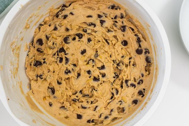 Chocolate chips cookies recipe. Top view of cookie batter in a bowl