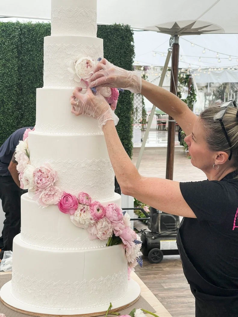Amy Cullifer Decorating Wedding Cake