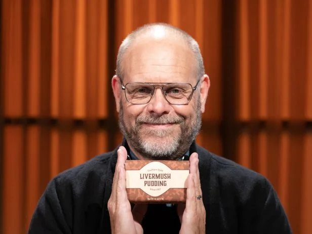 Judge Alton Brown and round 3 fan choice basket ingredient Livermush Pudding,  as seen on Chopped, Season 50, Alton Brown Maniacal Baskets Tournament.