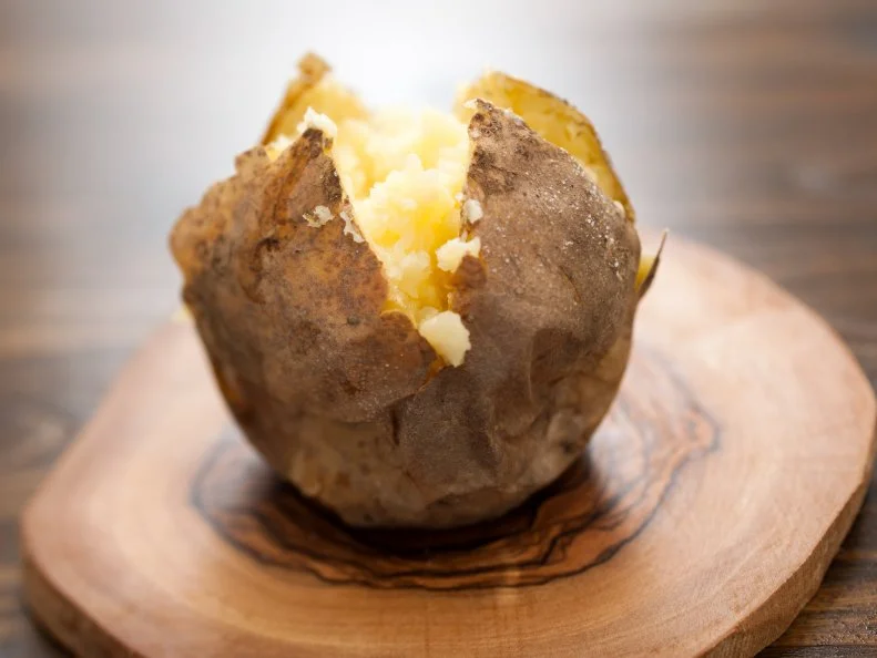 Plain hot baked potato with just butter.