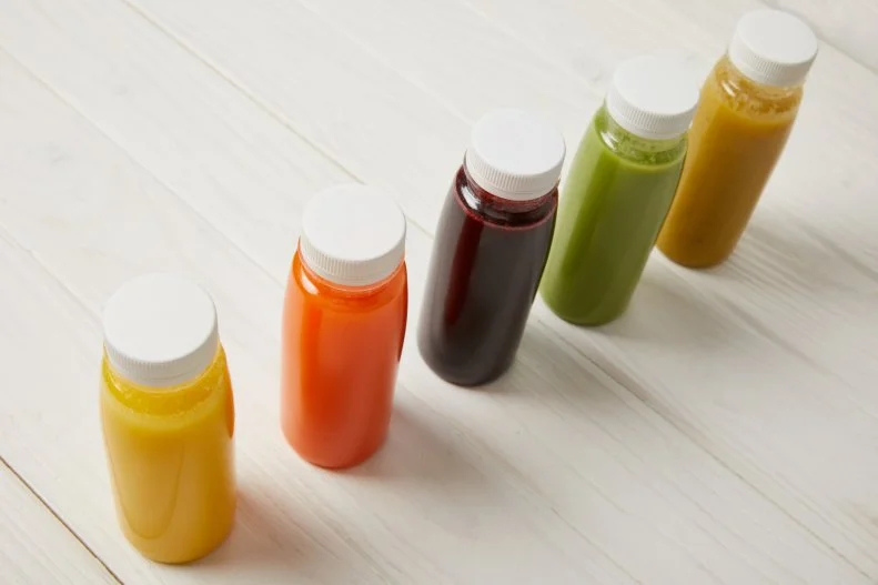 Bottles of Colorful Juice Smoothies