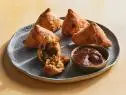 Description: Food Network Kitchen's Samosas with Tamarind-Date Chutney.